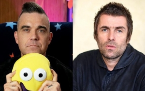 Robbie Williams Takes a Dig at Liam Gallagher Feud by Calling Him 'D**khead'