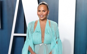 Chrissy Teigen Takes Pride in Her Non-'Surgically Enhanced Curves' After Shamed Over 'Square' Body