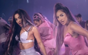 Futuristic Lady GaGa and Ariana Grande Let Loose in Music Video for 'Rain On Me'