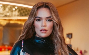 Karol G Responds to Backlash for Using Her Multi-Colored Dog in BLM Post