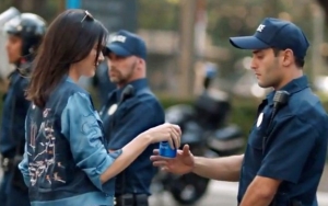 Protesters Mock Kendall Jenner's Pepsi Ad by Recreating It at Demonstrations