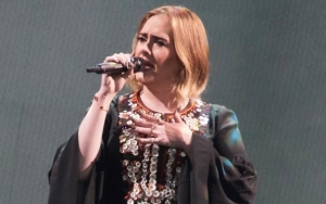 Adele Denies Rumors of New Music, Tells Fans to 'Wear Mask and Be Patient' 