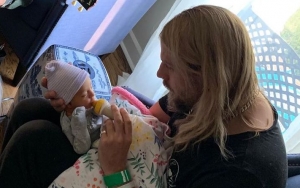 Judas Priest's Richie Faulkner on Daddy Duty in First Pic of Newborn Baby 