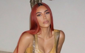Kim Kardashian Reaches Settlement in Legal Feud With Paparazzo Over Instagram Picture
