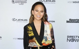 Chrissy Teigen Shows Off Side Effect to Her Sour Candy Cravings: My Tongue Is Falling Off