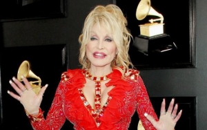 Dolly Parton Openly Gushes Over Her 'Pretty' and 'Artful' Tattoos