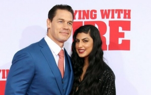John Cena and Shay Shariatzadeh Posing Outside Courthouse After Obtaining Marriage License