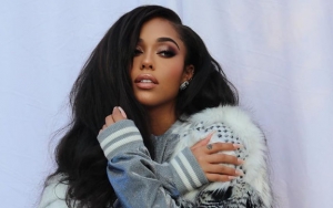Jordyn Woods Goes Braless in See-Through Dress at PrettyLittleThing Launch