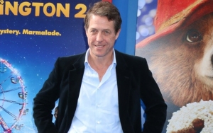 Hugh Grant Gets Cheeky Over His Desperation to Smell When Talking About COVID-19 Battle