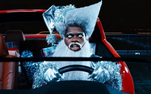 Lil Nas X Is Futuristic Santa in 'Holiday' Music Video