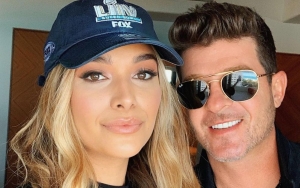 Robin Thicke's Pregnant Fiancee Tells Off Body-Shamers: No Man Owns My Body