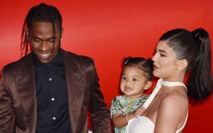 Travis Scott Takes Playful Jab at Kylie Jenner Over 'Blurry' Photo of Him With Daughter Stormi