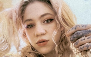 Grimes Offers A Look at 'Viking'-Inspired Haircut She Gave Her Baby Boy