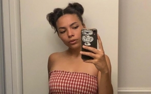 David Bowie and Iman's Daughter Hits Back at 'Dim Witted' Troll Twisting Her Swimsuit Selfie
