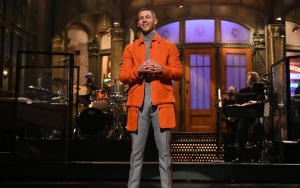 Nick Jonas Pokes Fun at Jonas Brothers Split Speculations During 'SNL' Monologue