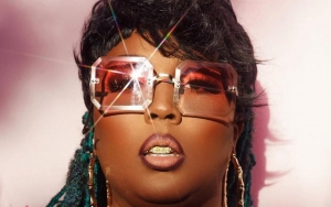 New Boo? Lizzo Spotted Cuddling Up to Mystery Man on Balcony