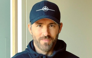 Ryan Reynolds Pokes Fun at His Style During COVID-19 Vaccination