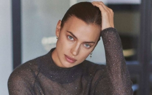 Irina Shayk Poses Seductively in Black Thong Jumpsuit