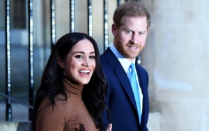 Pregnant Meghan Markle Spotted Carrying Baby Archie in 1st Pic Since Prince Harry's U.K. Return