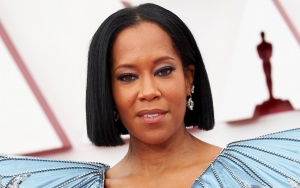 Regina King Acts Like a Pro After Almost Tripping During Oscars Opening