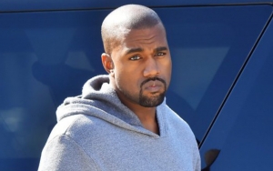 Kanye West's Grammy Worn Sneakers Shatter Record After Being Sold for $1.8M