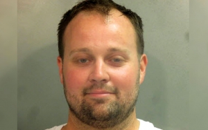 Josh Duggar Smirks in Mug Shot After Arrested by Federal Agents
