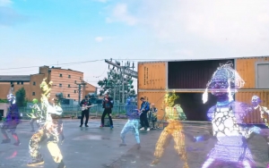 Coldplay Joined by Alien Holograms on 'Higher Power' Music Video