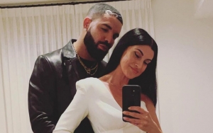 Drake Causes Twitter Meltdown After Posing in Intimate Photo With a Woman