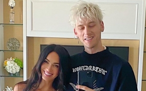 Megan Fox Packs on the PDA With Machine Gun Kelly During Surprise Appearance at Indy 500 Party