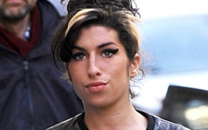 Amy Winehouse's Best Friend Blames Paparazzi for Her Death