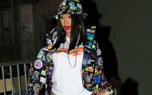 Cardi B's Daughter Kulture Adorably Plants a Smooch on Mom's Growing Baby Bump
