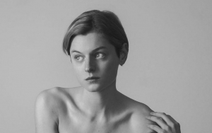 Emma Corrin Wears Chest Binder as She Changes Pronouns to She/They