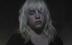 Billie Eilish Walks in Darkness While Exploring Bad Effects of Fame in 'NDA' Music Video