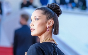 Bella Hadid Sets Tongue Waging With Chest-Baring Dress at Cannes Film Festival