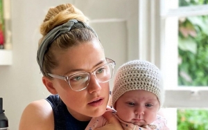 Amber Heard Proudly Embraces Double Duty as 'Mom and Dad' to Baby Daughter
