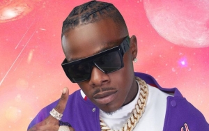 DaBaby Yells at Fan Throwing Shoe at Him During Rolling Loud Performance