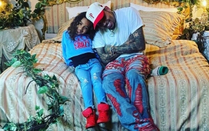 Chris Brown's Daughter Royalty Fearlessly Swims With and Cuddles Up to Baby Tiger