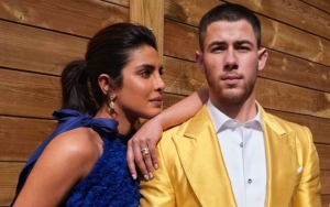 Priyanka Chopra Posts Intimate Photo of Nick Jonas Treating Her Like 'Snack'