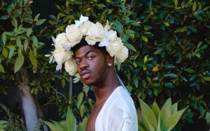 Lil Nas X Celebrates Debut Album 'Montero' With Eyebrow-Raising Pregnancy Photos