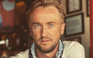 Tom Felton Lets Out Smile While Taken Off Golf Course After Collapsing
