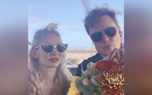 Grimes and Elon Musk Are 'Semi-Separated'