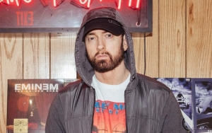 Eminem Flashes Middle Finger While Surprising Fans at Mom's Spaghetti Restaurant Grand Opening