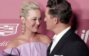 Orlando Bloom Undoes Katy Perry's Corset Onstage at Power of Women