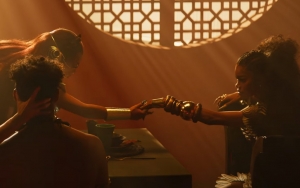Doja Cat Helps Queen Teyana Taylor Keep Her Throne in 'Woman' Music Video