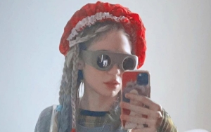 Grimes Goes Topless in Latest Social Media Post Weeks After Sparking Pregnancy Rumors