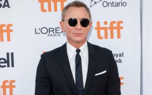 Daniel Craig Laughs at Himself After Realizing He's Bleeding From Forehead During Interview