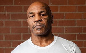 Watch Mike Tyson Throw Punches at Annoying Fan During Flight