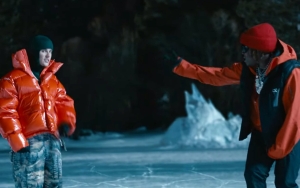 Justin Bieber and Don Toliver Race Through the Woods on Snowmobiles in Fiery 'Honest' MV
