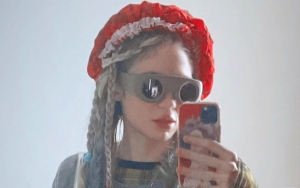 Grimes Praised for Auctioning Off Her 2021 Met Gala Accessories for BIPOC Families in Ukraine