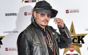 Johnny Depp Takes Mystery Redhead Woman in Tow to Rehearsal